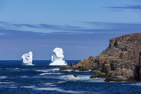 An iceberg along the Newfoundland coastline in summer, very popular with tourist.の写真素材