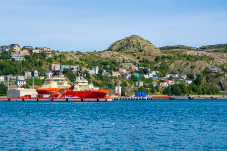 ST. JOHN'S, NEWFOUNDLAND AND LABRADOR, CANADA - SEPTEMBER 2, 2019. Offshore supply vessels in the port of St. John's from the offshore oil production fields, taken on SEPTEMBER 2, 2019, in St. John's.のeditorial素材