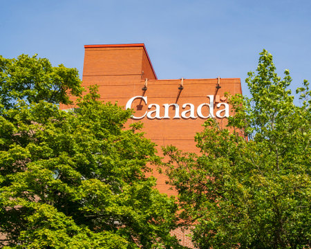 ST. JOHN'S, NEWFOUNDLAND AND LABRADOR, CANADA - SEPTEMBER 2, 2019.  Sign on a building identifying it as a government of Canada building, taken on September 2, 2019 in St. John's.のeditorial素材