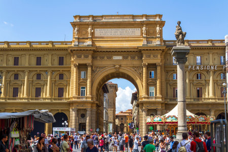 FLORENCE, ITALY â AUGUST 19, 2015. People walking in the Piazza Della Repubblica in the center of Florence, taken on August 19 2015 in Florence.のeditorial素材