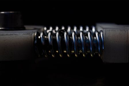 Spring with shaft from a piece of mechanical equipment.の写真素材