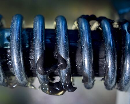 Spring with shaft from a piece of mechanical equipment.