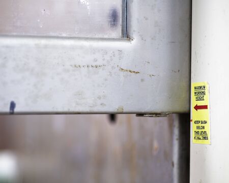 Fume hood glass sash at the correct level.