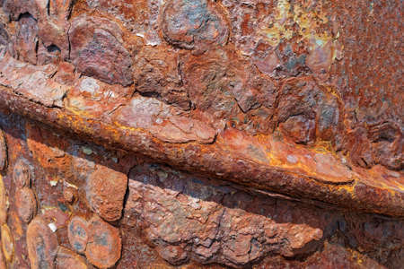 Oxidation of a metal surface showing rusting and corrosion.の写真素材