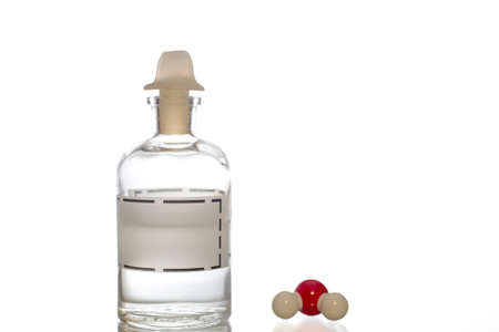 Reagent bottle and chemical structure of distilled water.の写真素材
