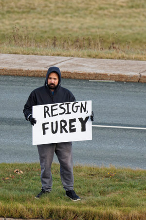 ST. JOHN'S, NEWFOUNDLAND AND LABRADOR, CANADA â NOVEMBER 20, 2021.  Citizens protesting vaccine mandates for COVID at the Newfoundland and Labrador House of Assembly (Confederation Building), taken on November 20, 2021, in St. John's.のeditorial素材
