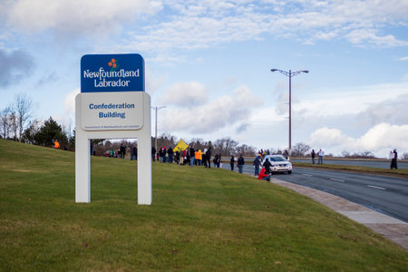 ST. JOHN'S, NEWFOUNDLAND AND LABRADOR, CANADA â NOVEMBER 20, 2021.  Citizens protesting vaccine mandates for COVID at the Newfoundland and Labrador House of Assembly (Confederation Building), taken on November 20, 2021, in St. John's.のeditorial素材