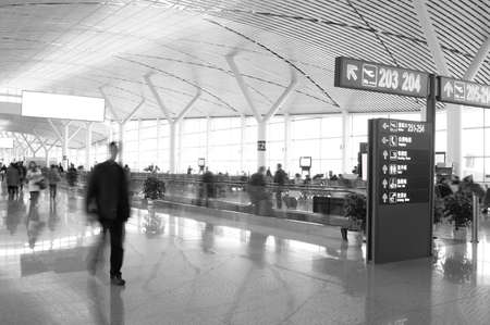 Passengers in the Shanghai Pudong airport. Interior of the airportのeditorial素材
