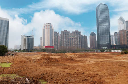 Construction site with crane and buildingの写真素材