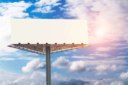 Blank billboard on blue sky for your advertisementの写真素材