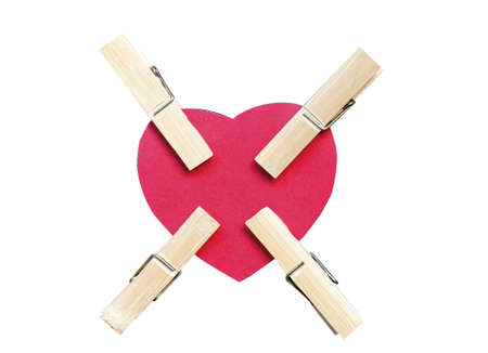 Four clips pinch red heart on white backgroundの写真素材