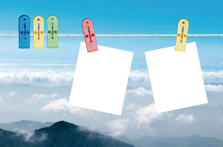 blank note papers in blue backgroundの写真素材