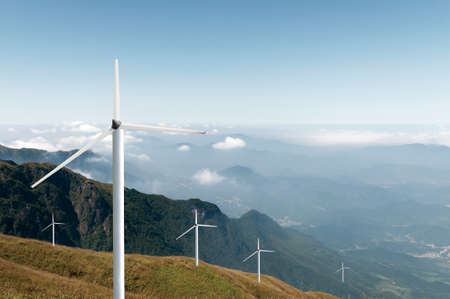 wind power farm over a hill