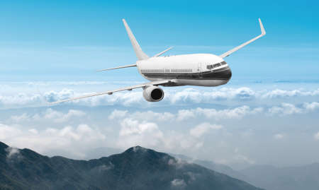 Passenger airliner flight in the blue skyの写真素材