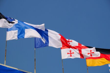 various national flags flapping in the windの写真素材