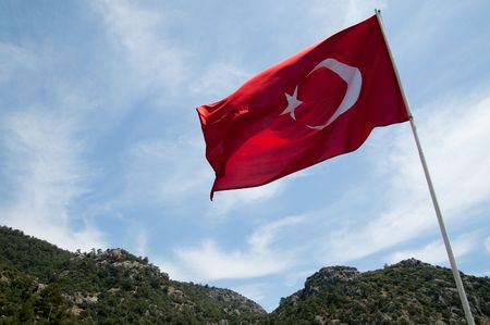 Turkish flag on flagpole. Turkey. Mediterranean Sea