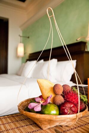exotic fruits in the hotel roomの写真素材