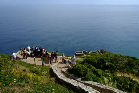 Tourists along the lighthouse at the Cape Of Good Hope, South Africa.の写真素材