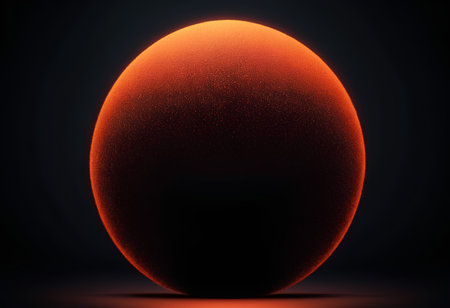 3d rendering of an orange planet isolated on a black background.の素材