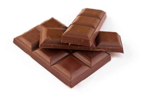 Blocks of chocolate isolated on white background 