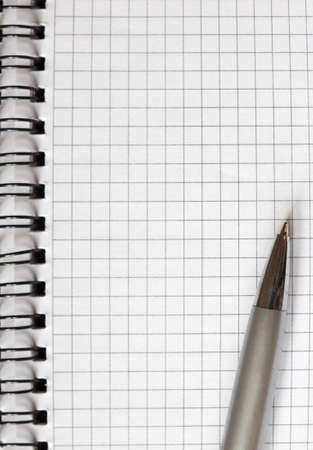 open notebook and a pen close-upの写真素材