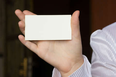 female hand holding a cardの写真素材