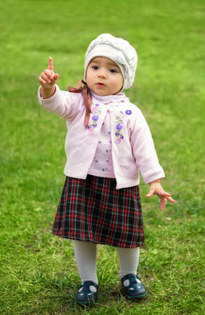 girl on the green grass の写真素材