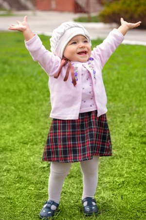 girl on the green grass の写真素材