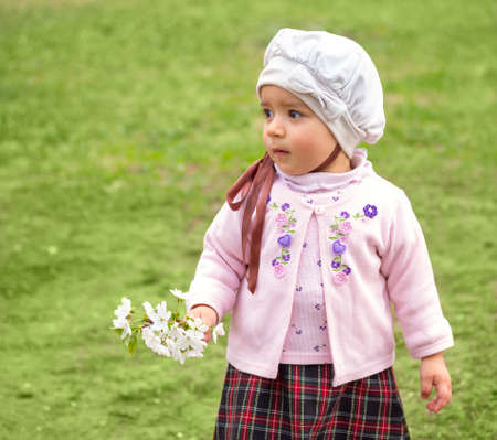 girl on the green grass の写真素材