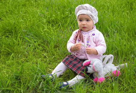 girl on the green grass の写真素材