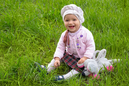 girl on the green grass の写真素材