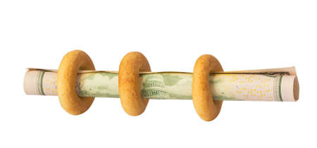bagels with dollars on whiteの写真素材