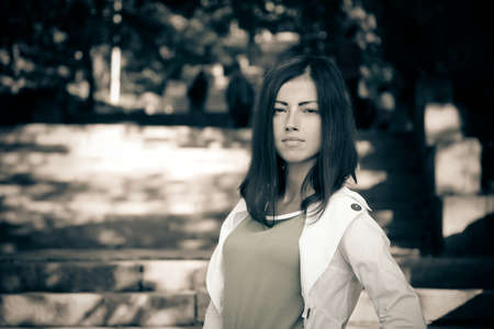 young woman in the parkの写真素材