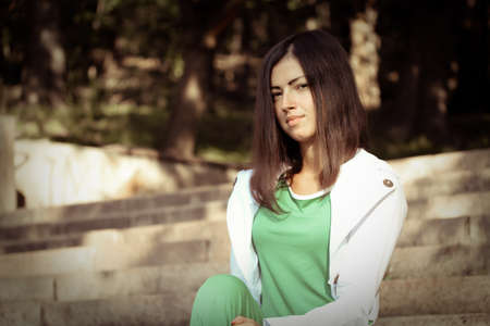 young woman in the parkの写真素材