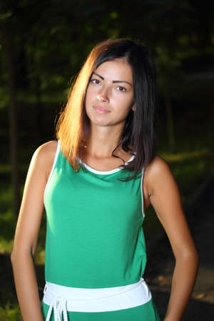 young woman in the park in autumnの写真素材