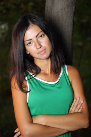 young woman in the park in autumnの写真素材
