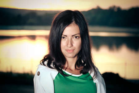 woman in the park in autumnの写真素材