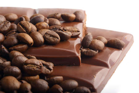 macro shot of chocolate and coffee beans の写真素材