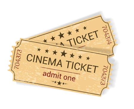 pair of vintage yellowish old cinema tickets on white