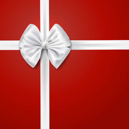 white silky bow ribbon over red background. holidays gift symbol decorative design element. vectorのイラスト素材