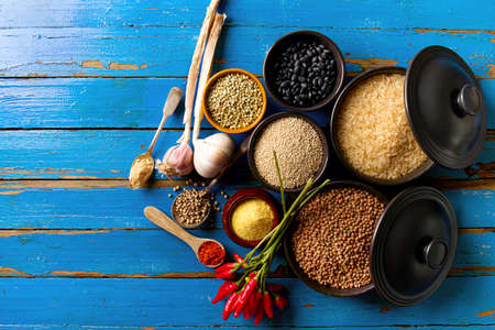 Beautiful Tasty Appetizing Ingredients Spices Grocery for Cooking Healthy Kitchen. Blue Old Wooden...