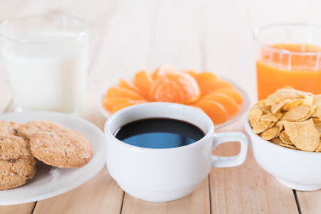 Table Breakfast - Continental Breakfast, fruit, cereals and orange juiceの写真素材