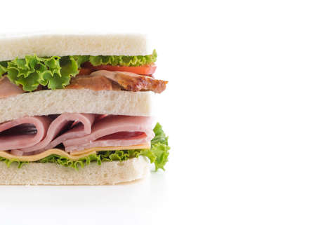 chicken and ham sandwich on white backgroundの写真素材