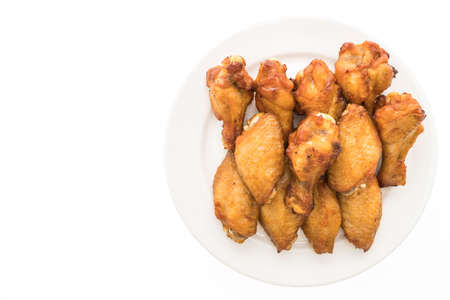 Grilled bbq chicken wing in white plateの写真素材