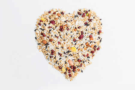 Border frame of Corn kernel seed meal and grains in bags isolated on a white backgroundの写真素材