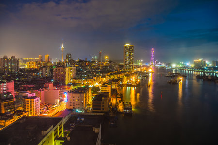Beautiful architecture building cityscape of macau city skyline at nightの写真素材