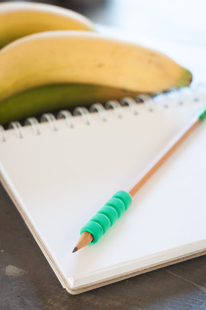 Shopping list with Healthy fruitsの写真素材
