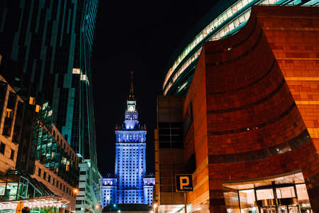business buildings of Warsaw Poland in the light of night lightsの写真素材