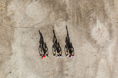 Miniature people : Travelers riding bicycleの写真素材
