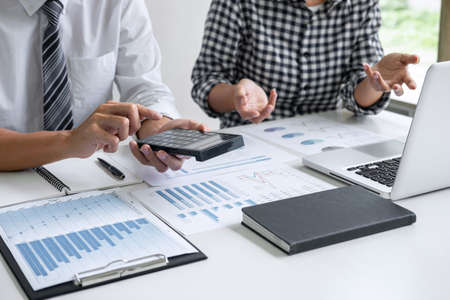 Teamwork of business casual colleagues, consultation new strategy plan business and market growth on...